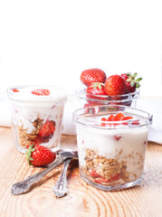 Breakfast - yogurt, granola and strawberries