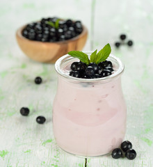 Fototapeta na wymiar Yogurt with blueberries
