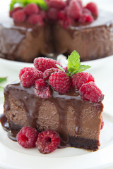 Chocolate cheesecake with raspberries.