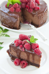 Chocolate cheesecake with raspberries.