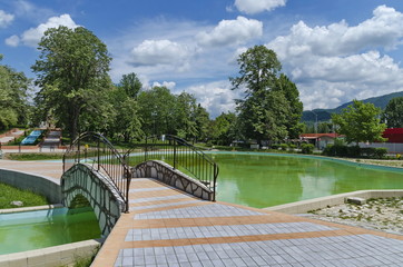 Fototapeta na wymiar Part of public gardens - fountains and pond