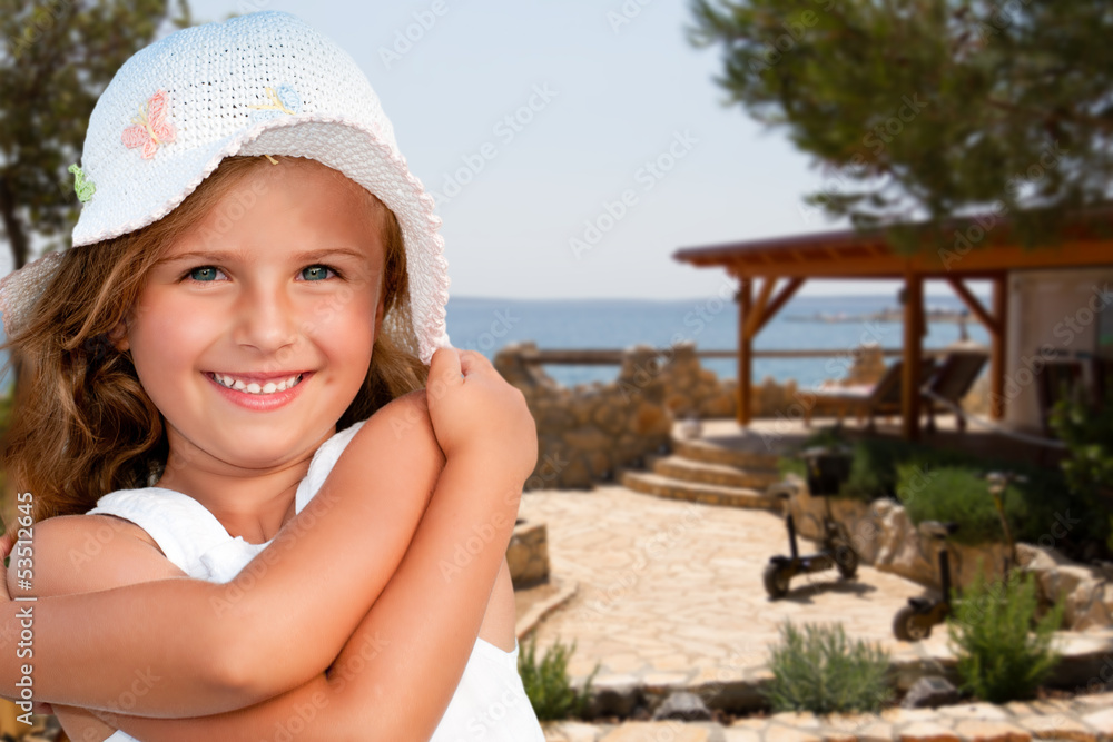 Wall mural Summer holiday - Portrait of lovely girl in beach resort