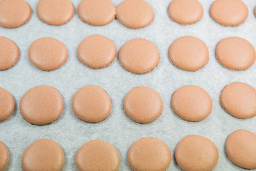 Baking French Macaron chocolate flavored cookies