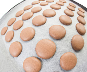 Baking French Macaron chocolate flavored cookies