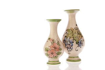 Two vases with flowers and grapes - 53516817