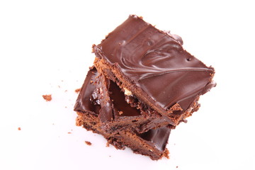 Slices of a brownie with white chocolate chunks