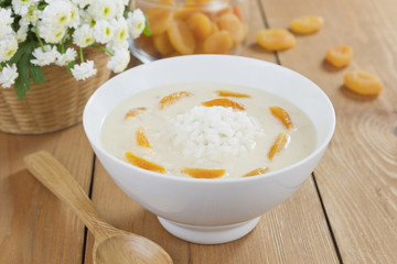 Rice soup with cream and dried apricots
