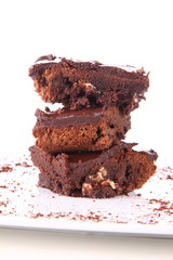 Slices of a brownie with white chocolate chunks