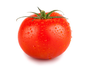 Single red tomato with water drops