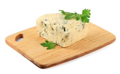 Tasty blue cheese on cutting board, isolated on white