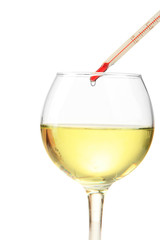 Glass of wine with thermometer, isolated on white