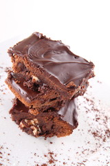 Slices of a brownie with white chocolate chunks