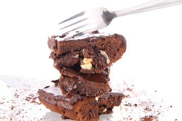 Slices of a brownie with white chocolate chunks
