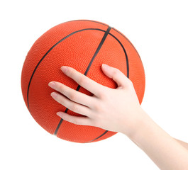 Basketball in woman hand isolated on white