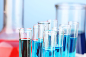 Test-tubes on color background