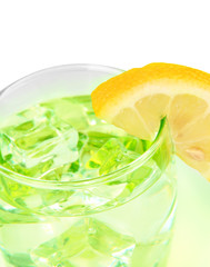 Glass with water and ice isolated on white