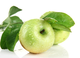 Juicy green apples with leaves, isolated on white