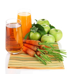 Glasses of juice, apples and carrots, isolated on white