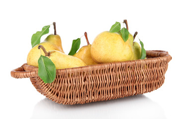 Juicy pears in wicker basket isolated on white