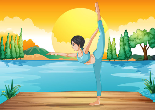 A girl performing yoga along the river in a sunset scenery