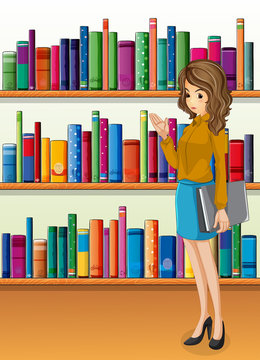 A lady holding a binder standing in front of the wooden shelves