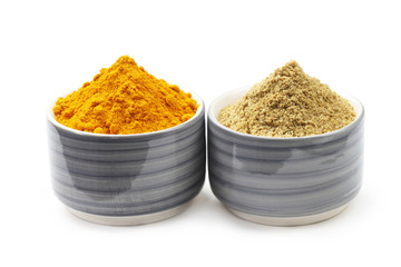 Raw Authentic Indian Spices in Two Ceramic Bowls