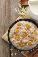 bowl of oatmeal on wood