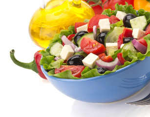 salad in bowl on white