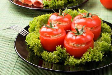 Tomatoes stuffed with ham egg and mayonnaise