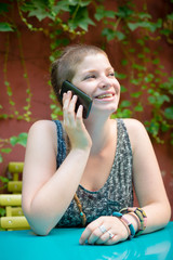 beautiful stylish modern young woman on the phone