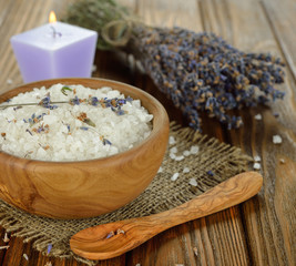 Sea salt with lavender in a wooden bowl