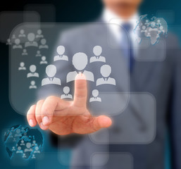 Businessman works with Social Network Display