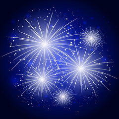 Starry fireworks in blue sky
