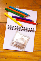 notebook with condom