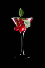 Cherries in a martini glass