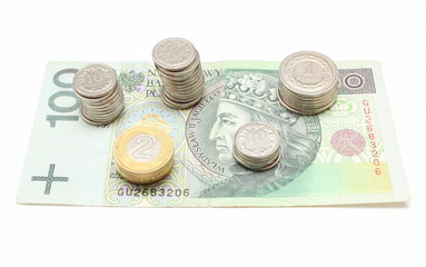 Banknote and coins on white background