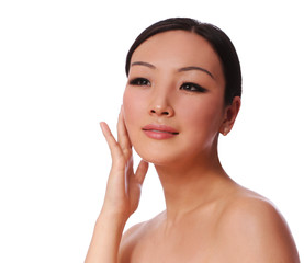 Obraz na płótnie Canvas skin care. woman applying cream on her face, isolated