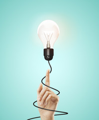 hand pointing to lamp