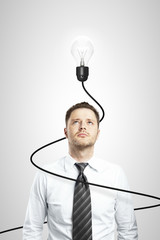 man and lamp with cable