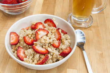 Warm millet pudding with Strawberries