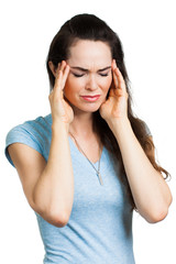 Woman suffering from migraine.