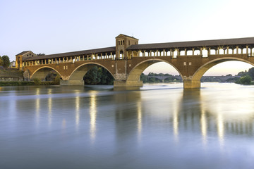 Pavia- covered bridge on Ticino river night view color image