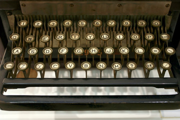 old typing machine has and letters