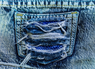 Torn jeans pocket