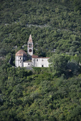 Fototapeta na wymiar Old church on the hillside
