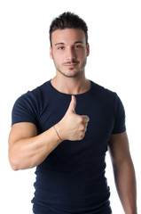 Handsome young man with thumb up doing OK sign