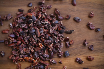Cacao or cocoa raw beans, crushed to nibs, superfood