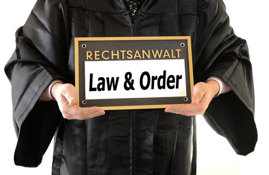 Lawyer in Robe with sign