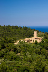 Fototapeta na wymiar The castle-house from Begur Hill at Catalonia Spain