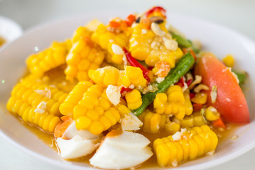 Thai food, corn salad with salted spicy sour dressing
